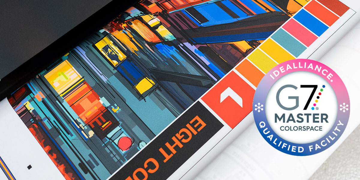 A vibrant, abstract print featuring color swatches displayed alongside the Idealliance G7 Master Colorspace Qualified Facility logo.