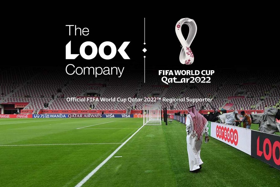 A graphic announcing The LOOK Company as an Official Regional Supporter for the FIFA World Cup Qatar 2022, set against a football stadium background.