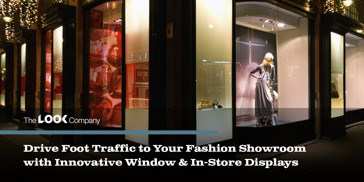A fashion store's brightly lit windows at night, showcasing innovative displays to attract shoppers.