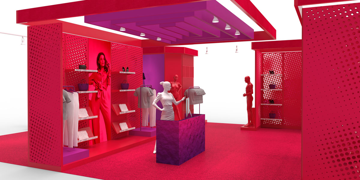 A vibrant red and magenta pop-up store interior displaying clothes, accessories, and mannequins with a perforated wall design.